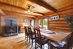 A beautiul wood walls, ceiling and floor room for entertainment or dining.