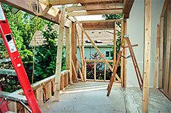 Outdoor contruction with wooden beams in place. 